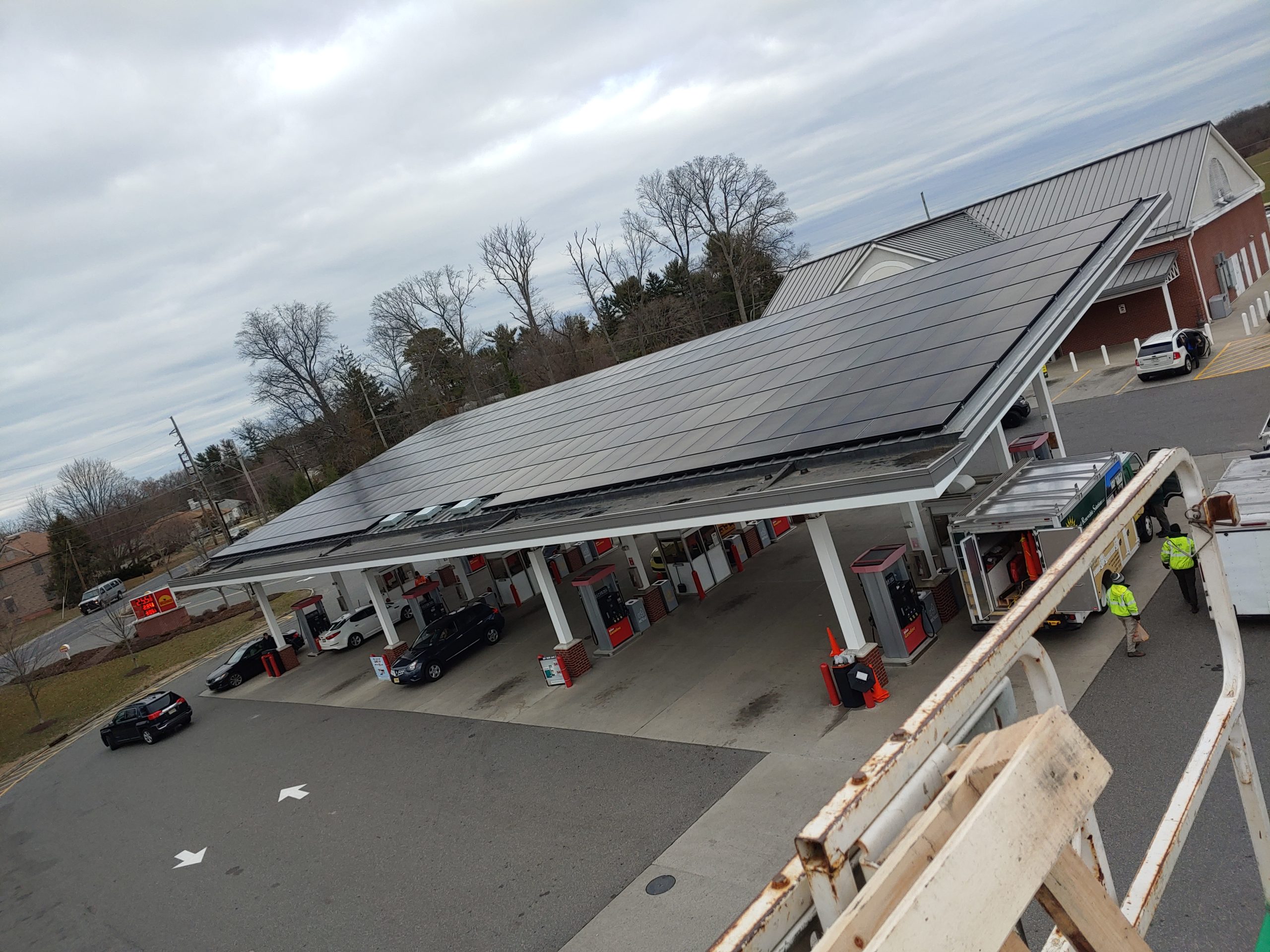 Solar panels on a gas station roof as part of a renewable energy project